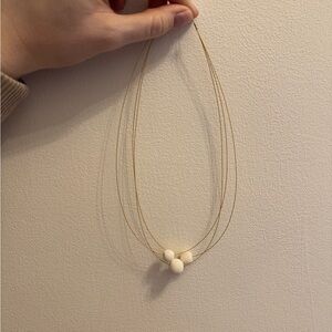 Elegant Gold and Cream Necklace